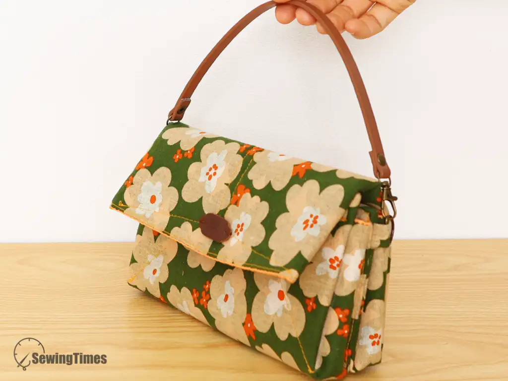 Read more about the article DIY Two-Compartment Handbag with Flap from One Piece of Fabric