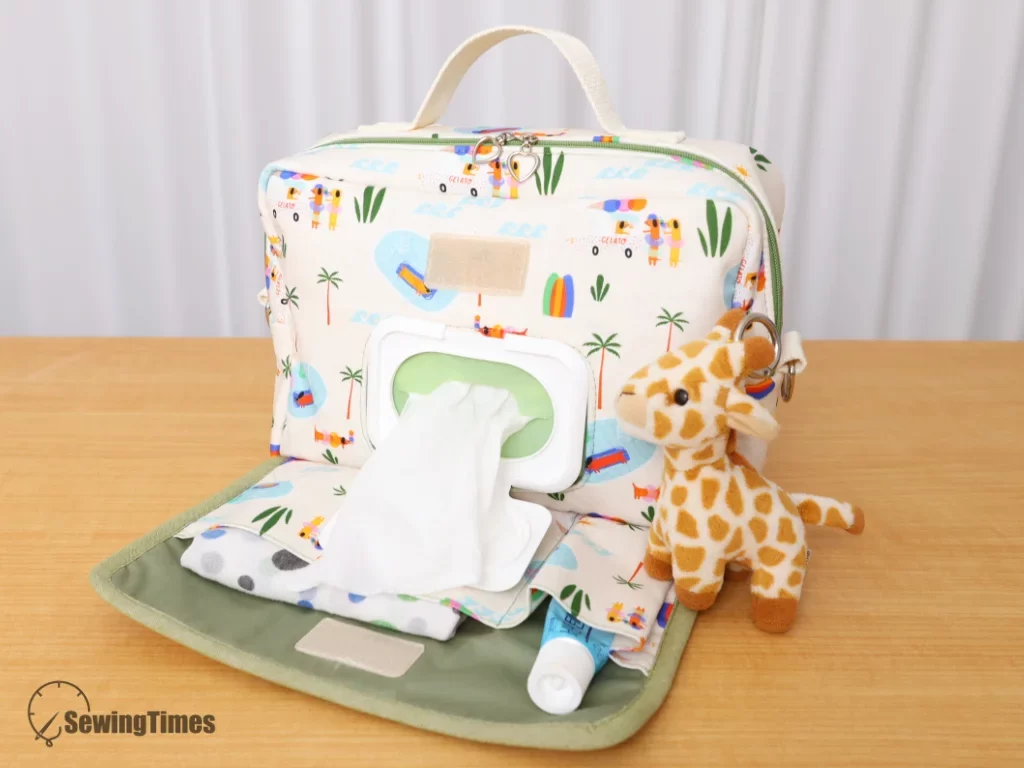 DIY wipes-ready crossbody diaper bag with built-in dispenser and beach pattern