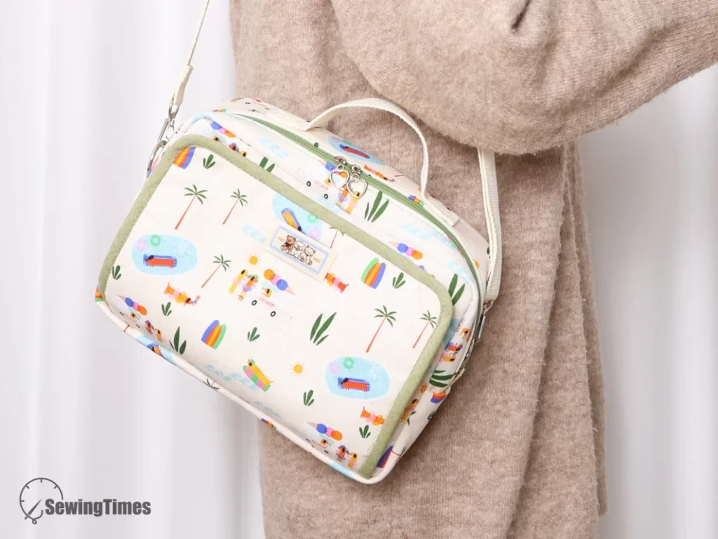 Woman wearing a DIY wipes-ready crossbody diaper bag with white shoulder strap
