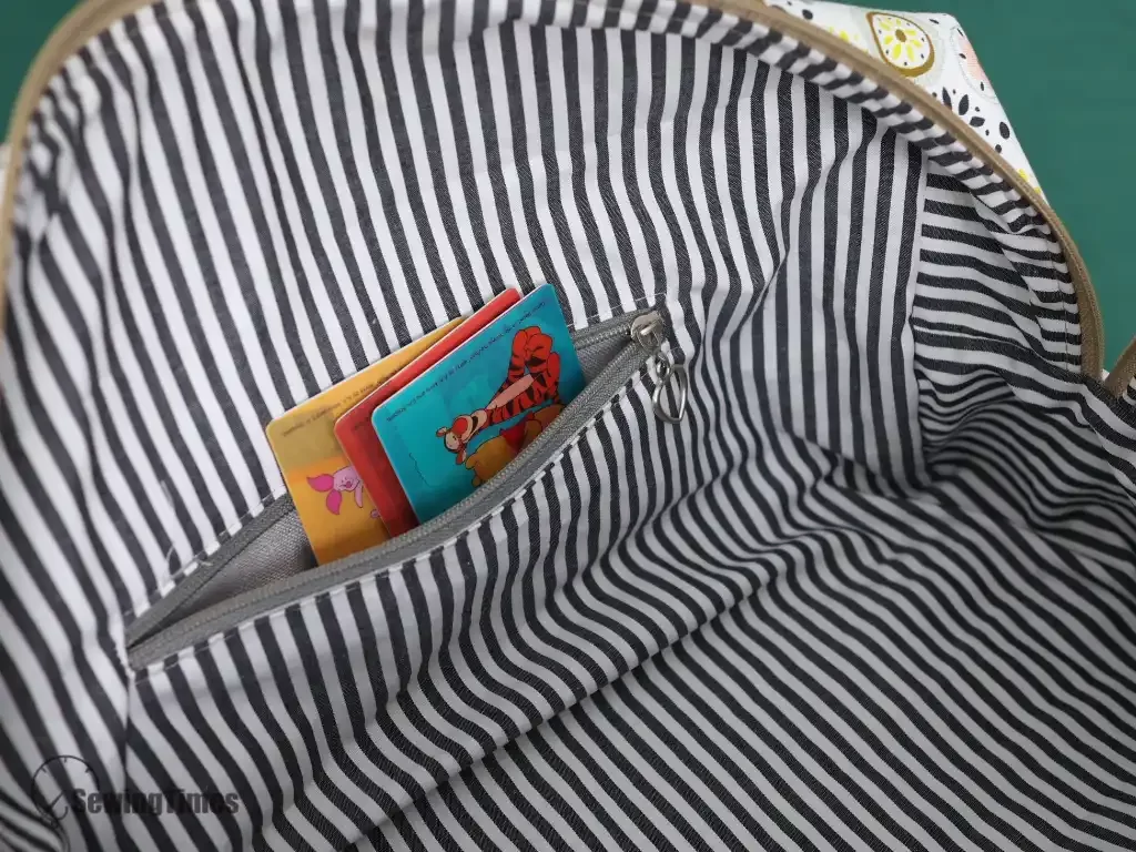 Close-up of the hidden interior zipper pocket of the DIY small duffle bag, highlighting its functional and secure storage.